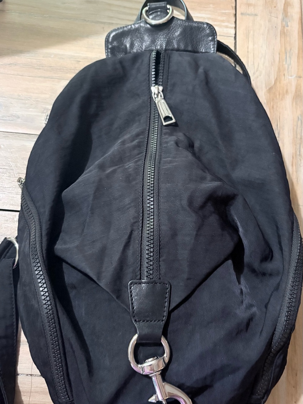 Rebecca Minkoff Black Sling Backpack with Silver Ring Accent